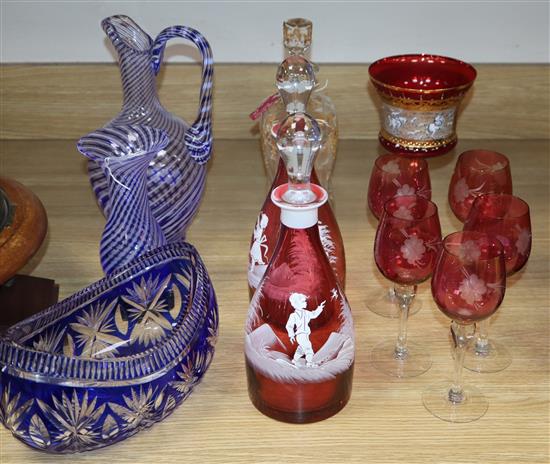 Two Mary Gregory decanters, Turkish glass jug and vase, cranberry glasses etc